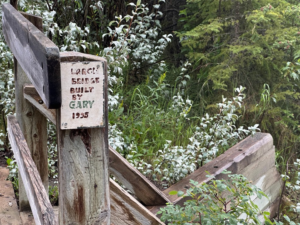 Close-up of the hand-lettered sign for Gary's large bridge