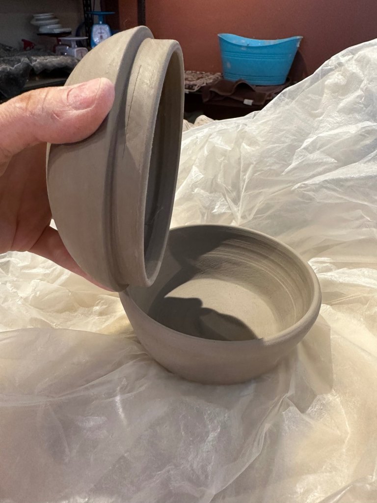 Moonlight’s urn with the lid lifted